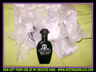 BOTTLES OF BLACK ROSE PERFUME